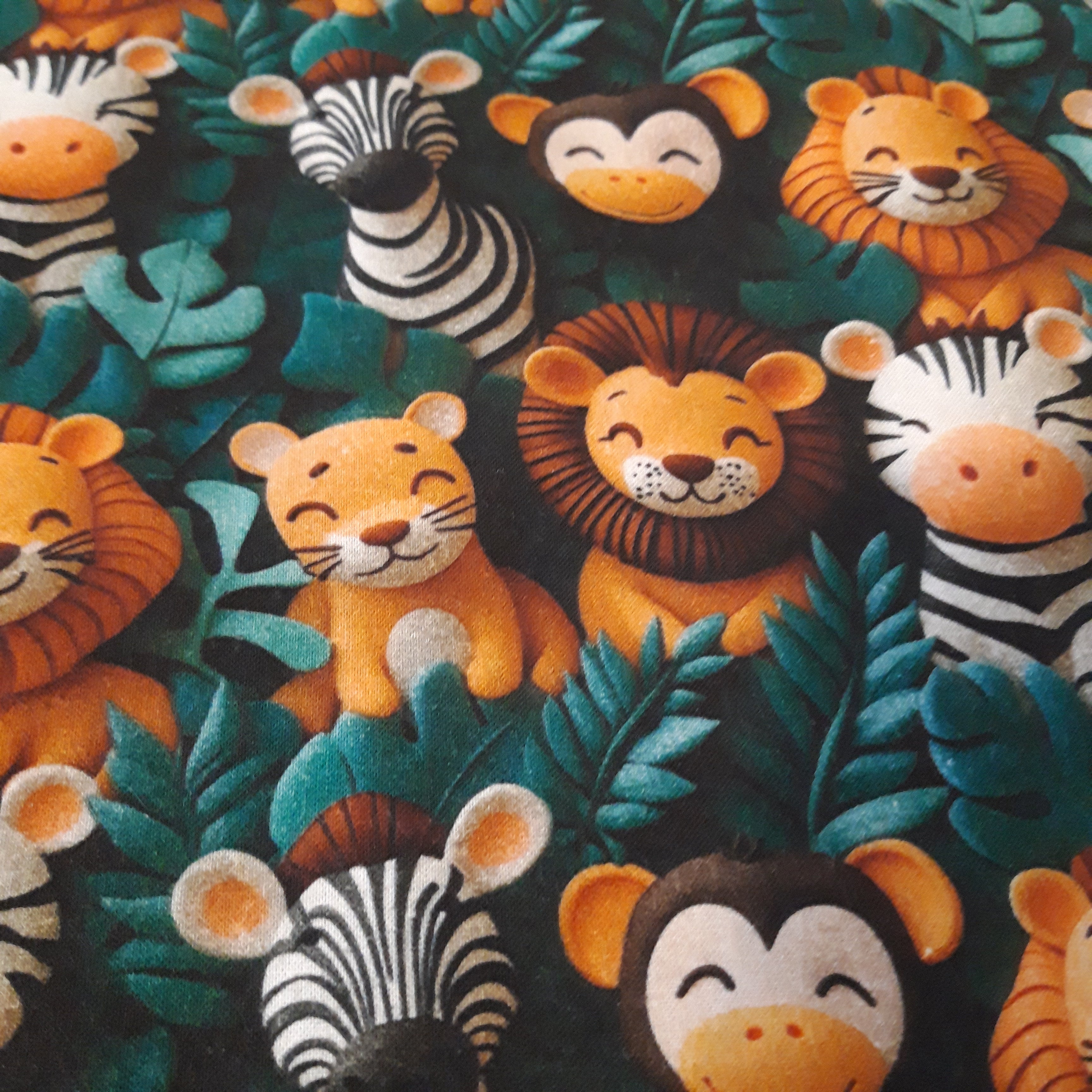 Bavoir élastique lion, zèbre et singe