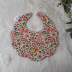 Bavoir fleur velours - fleurs dans la verdure