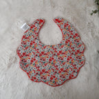 Bavoir fleur velours - fleurs rouges