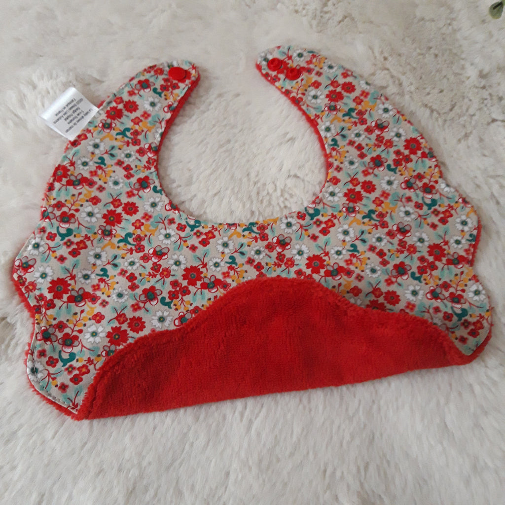 Bavoir fleur velours - fleurs rouges