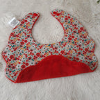 Bavoir fleur velours - fleurs rouges