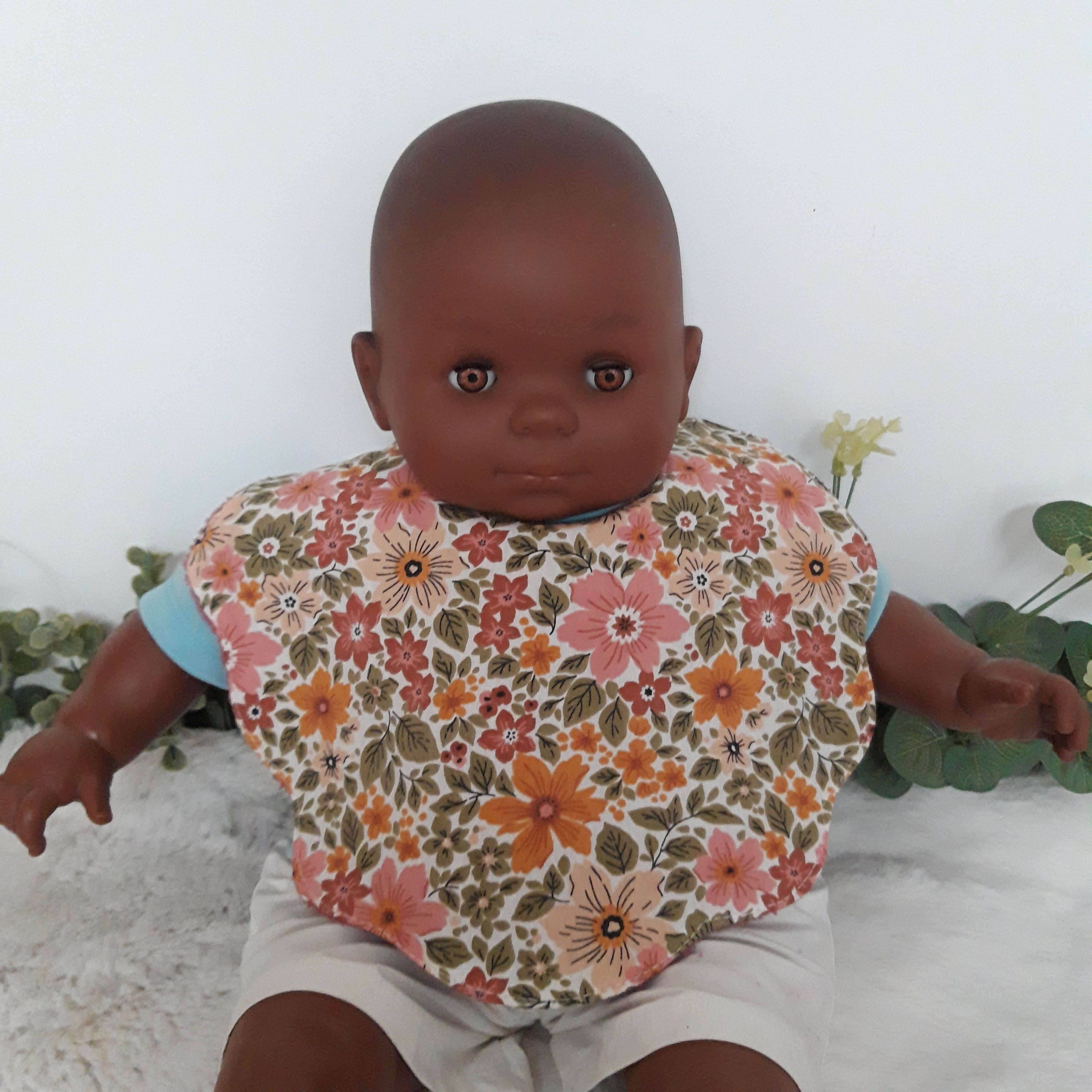 Bavoir fleur bambou - fleurs dans la verdure