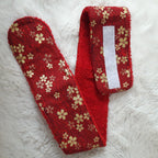 Bandeau de maquillage rouge et or