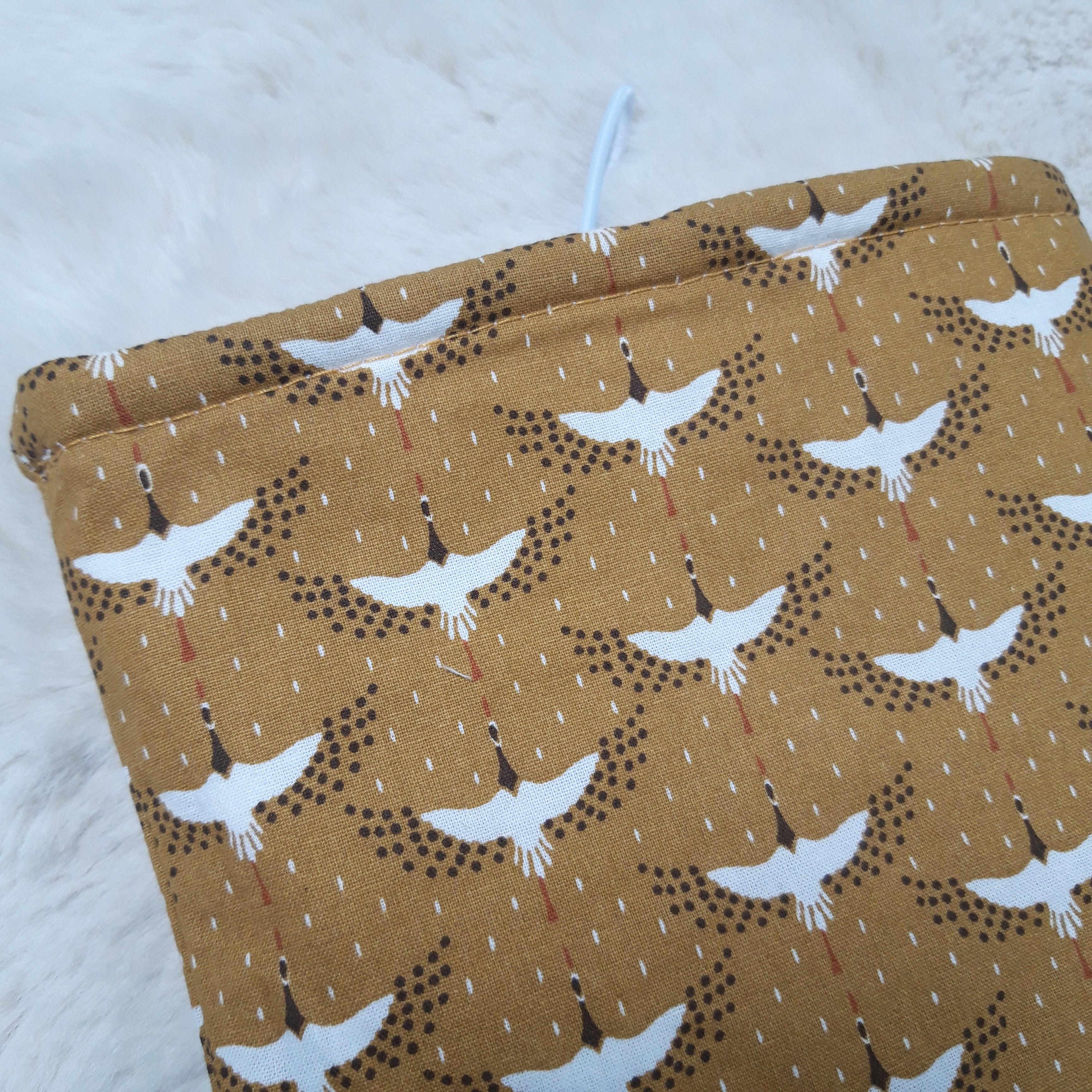 Pochette à livres blanc et oiseaux