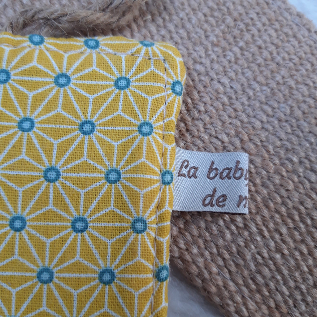 Eponge en toile de jute géométrique jaune et bleue