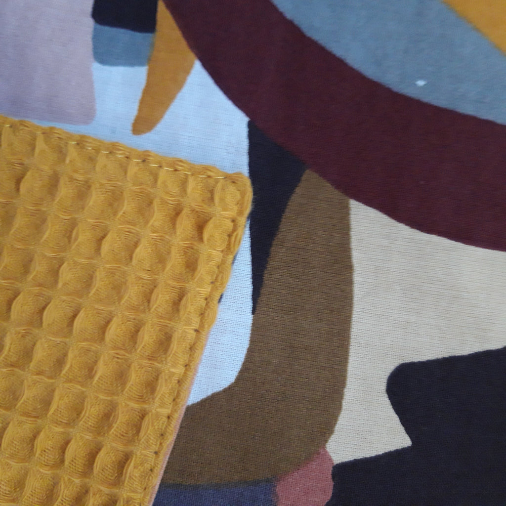 Essuie-tout avec lien visage