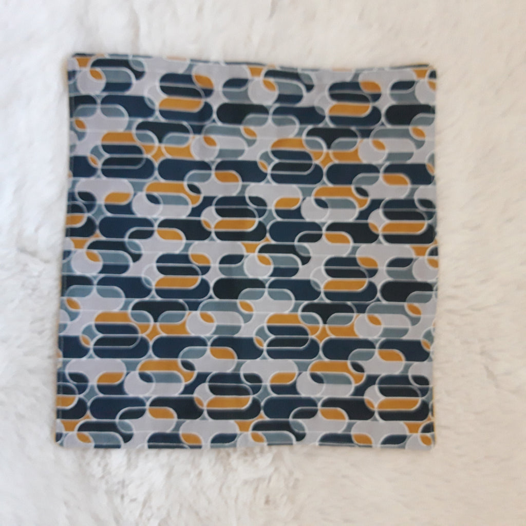 Essuie-tout géométrique bleu et moutarde