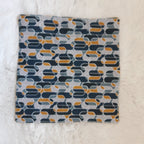 Essuie-tout géométrique bleu et moutarde