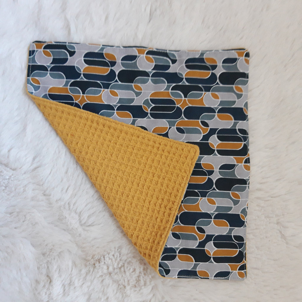 Essuie-tout géométrique bleu et moutarde