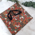 Sac à tarte en tissu enduit - Fleurs orange et noire