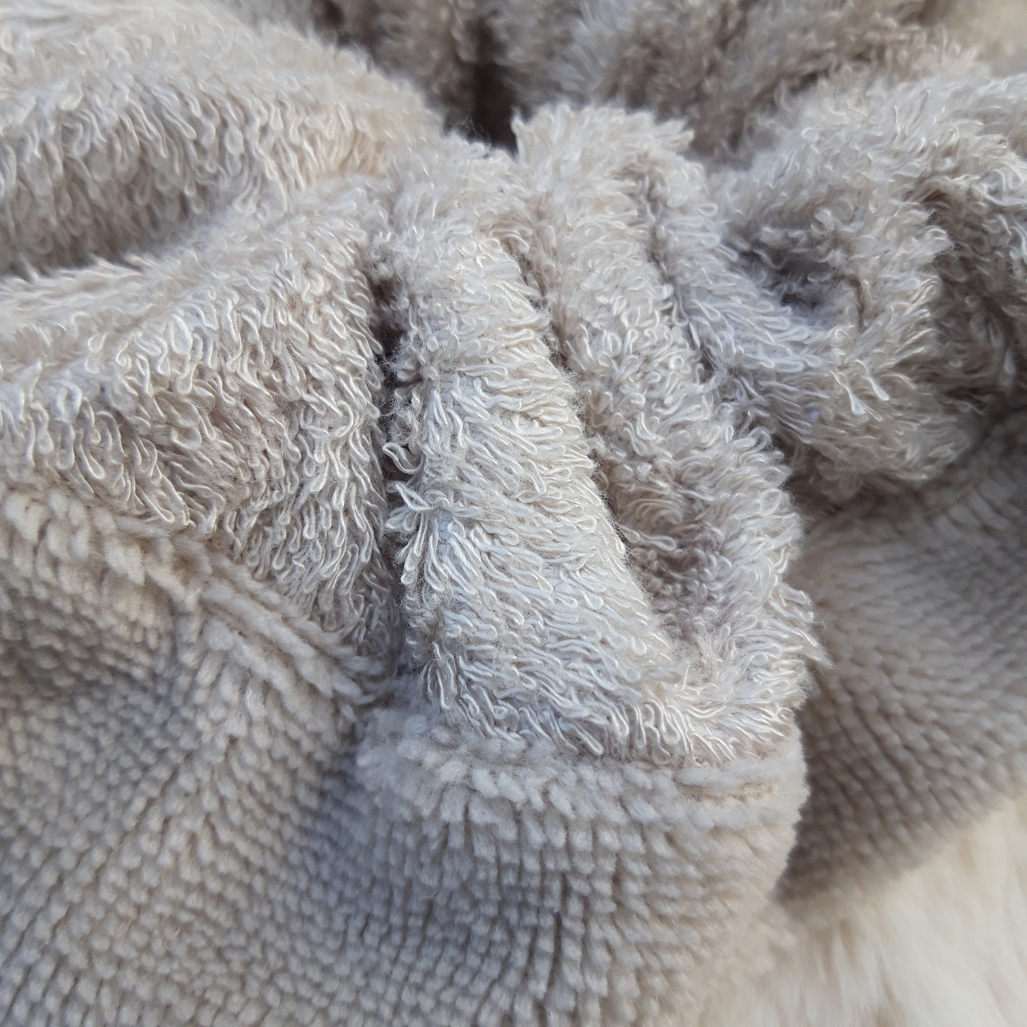 Fleur de douche beige et beige