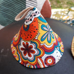 Manique conique pour fait-tout en fonte résistante à la chaleur Fleurie orange