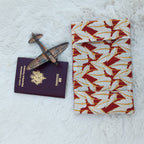 Protège passeport rouge avec feuilles