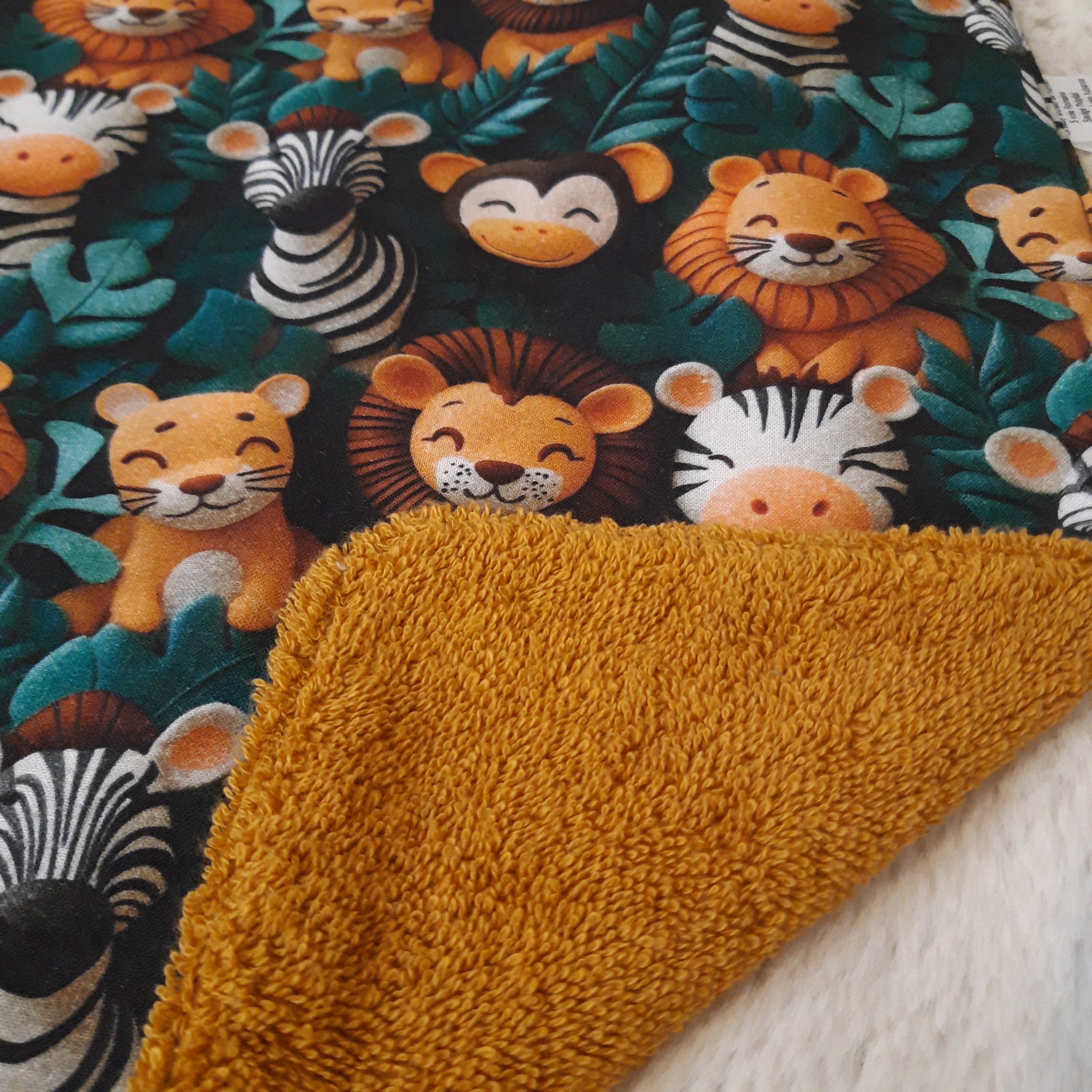 Bavoir élastique lion, zèbre et singe