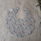 Bavoir fleur velours - fleurs beiges et bleues