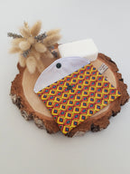 Petite pochette enduite armée géométrique jaune