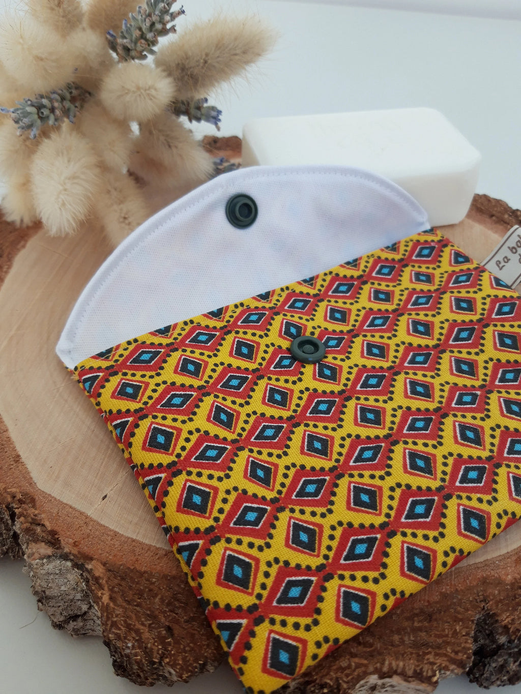 Petite pochette enduite armée géométrique jaune