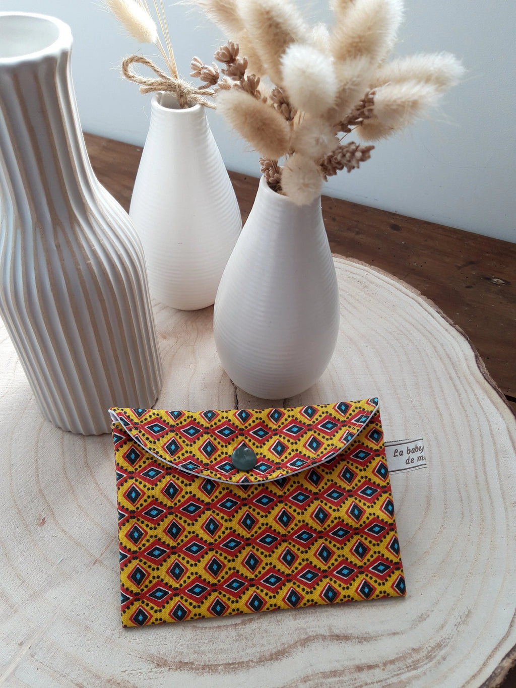 Petite pochette enduite armée géométrique jaune