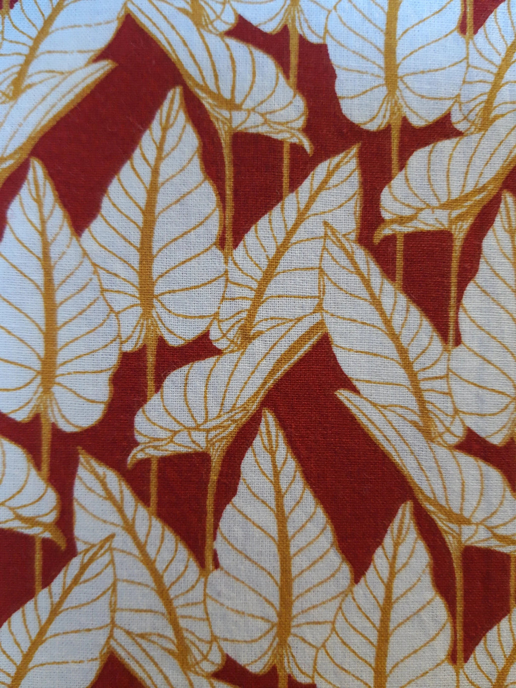 Pochette à livres blanc et feuilles rouges