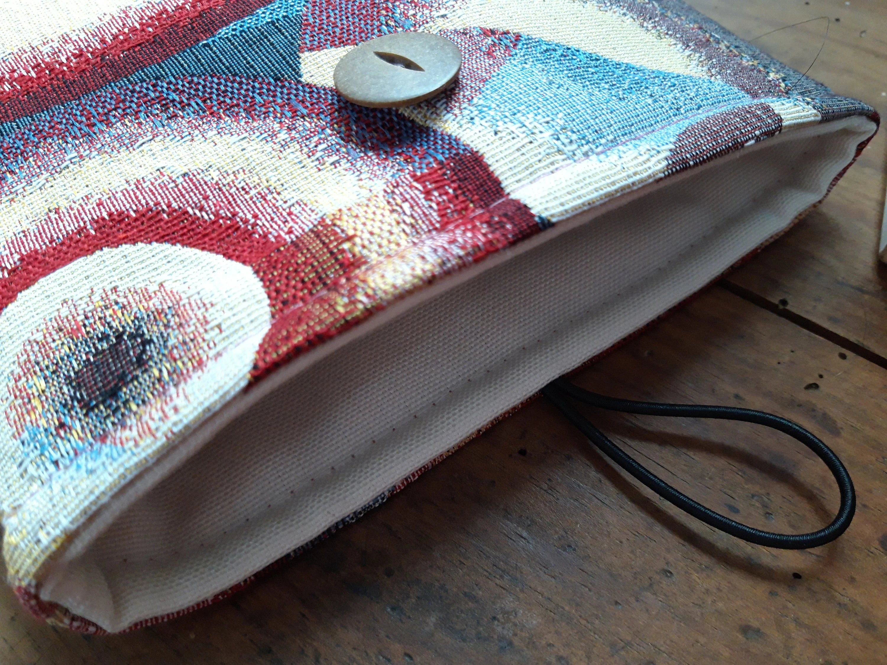 Pochette à livres géométrique